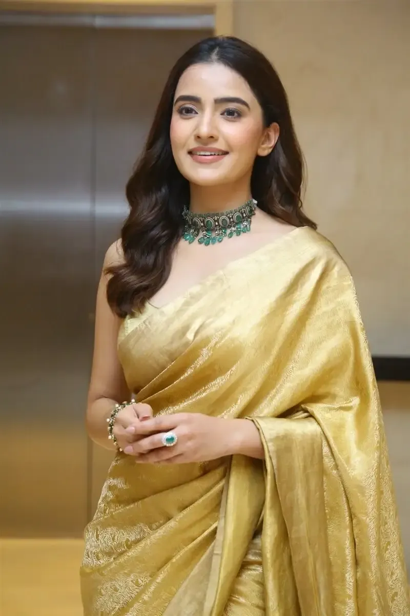 RUKSHAR DHILLON IN YELLOW SAREE AT MOVIE TEASER LAUNCH 2